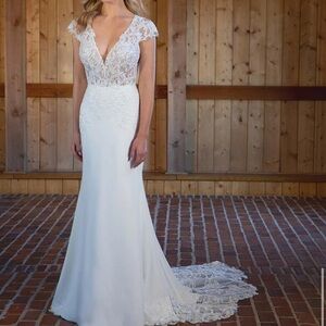 White Wedding Gown with Plunge Neckline and Flutter Sleeves